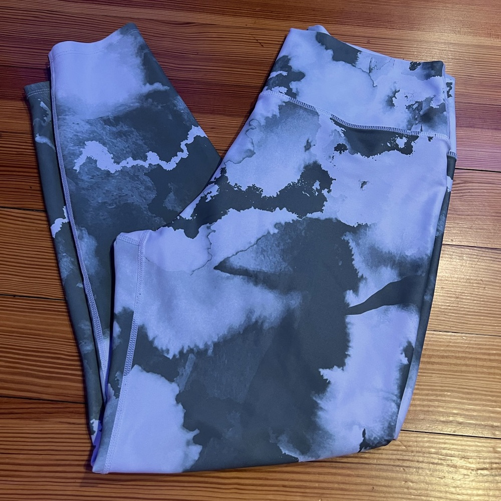 Capri length green patterned leggings.